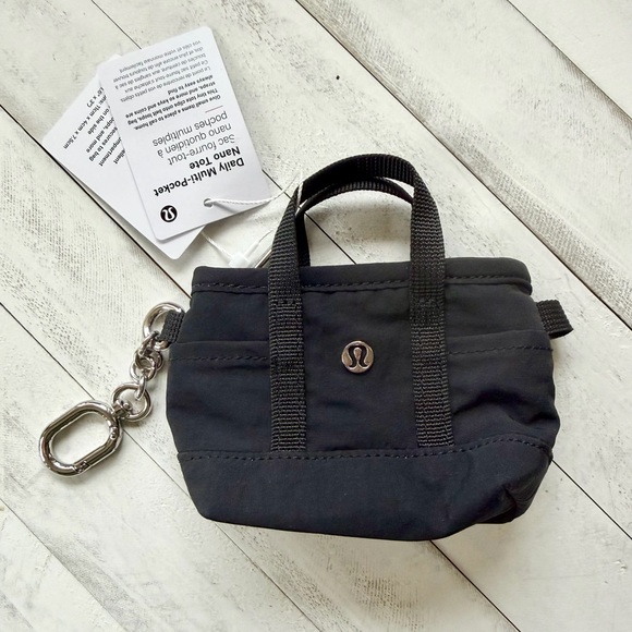 lululemon athletica Handbags - NWT Lululemon Daily Multi-Pocket Nano Tote Bag Black - Online Exclusive Sold Out